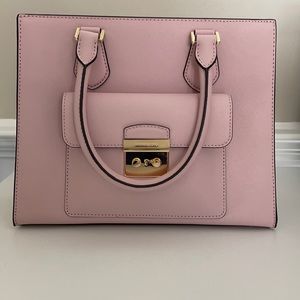 New! Michael Kors purse. Never used. My initials on the back In small writing.